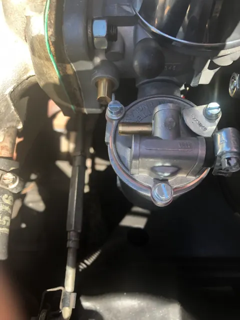 Fuel pump and throttle linkage in engine bay