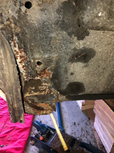 Rust damage at inner wing and chassis seam