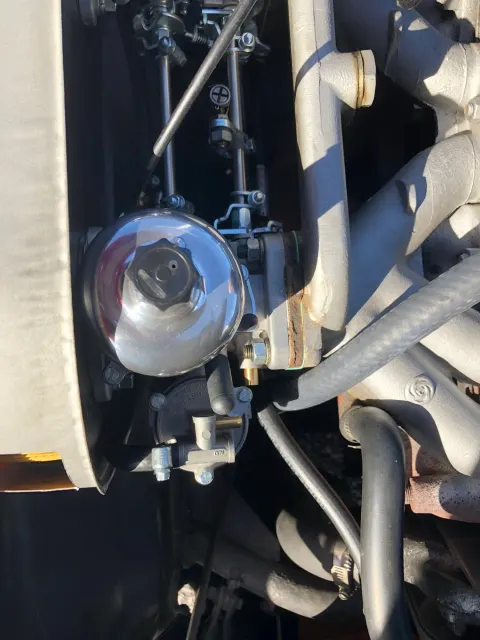 Chromed oil filter housing and engine bay pipework