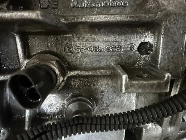 Cast alloy casing with part number 13-52-065-922