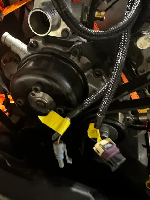 Water pump area with labelled sensor connectors