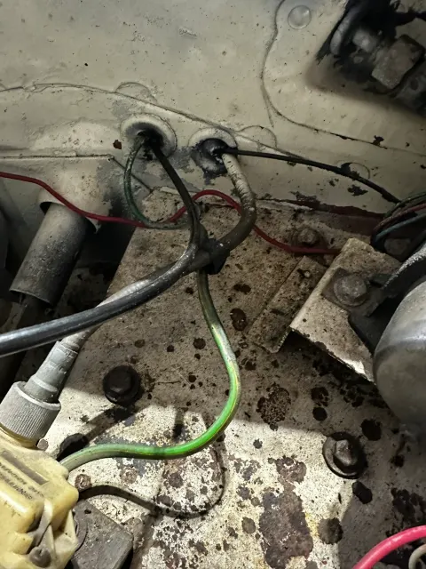 Grubby engine bay wiring through bulkhead grommets