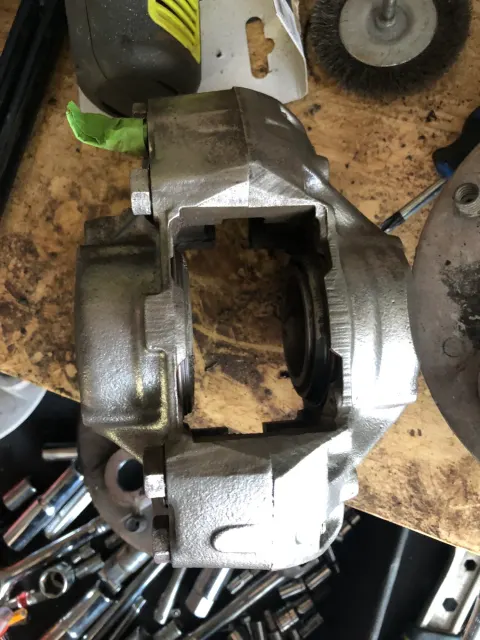 Front brake caliper body stripped and cleaned