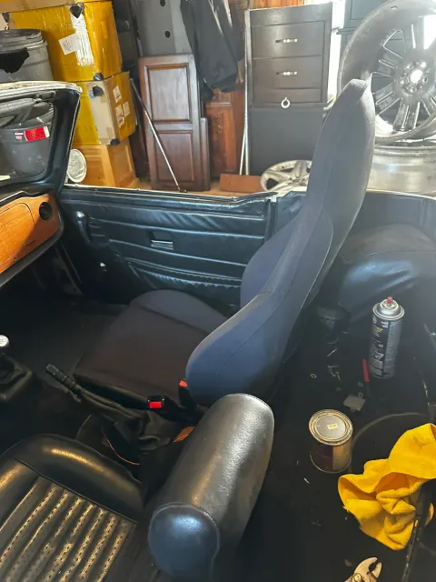 Trial-fitted bucket seat in bare cockpit