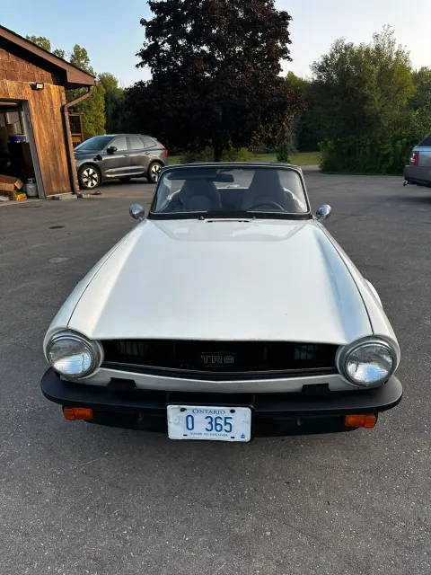 White TR6 front view with Ontario plate