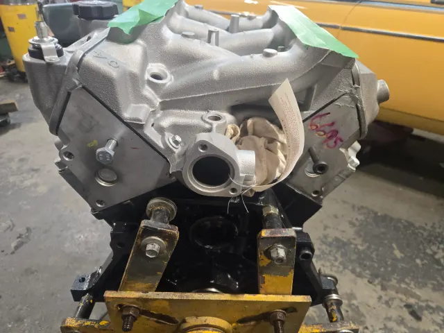 Freshly machined V-block on engine stand