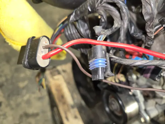 Disconnected sensor plug and wiring loom connectors