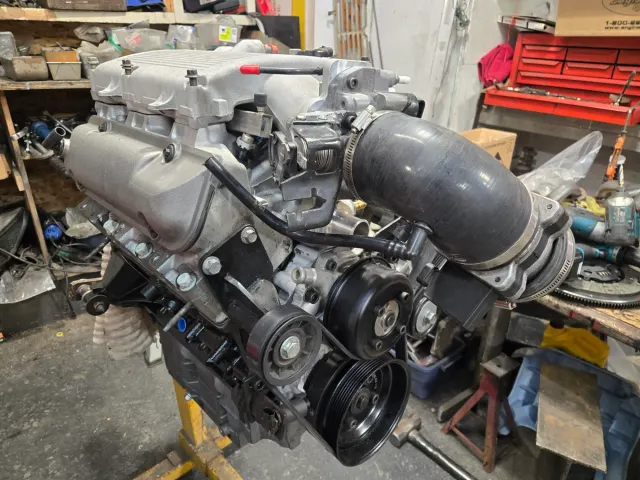 Modern V8 engine on stand in workshop