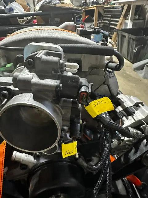 Modern throttle body with labelled IAC and TPS connectors